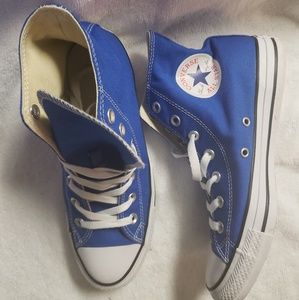 Royal  blue high top converse